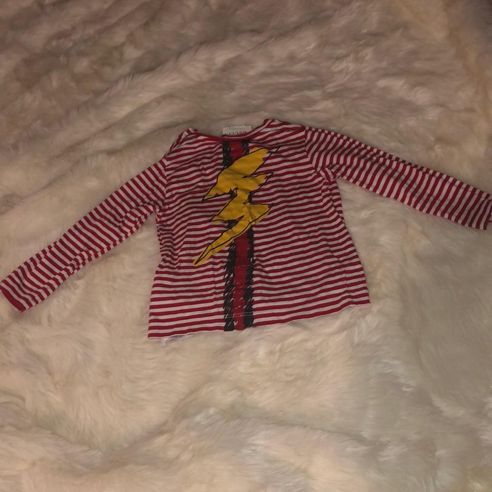 Gucci stripped shirt with logo and thunderbolt.